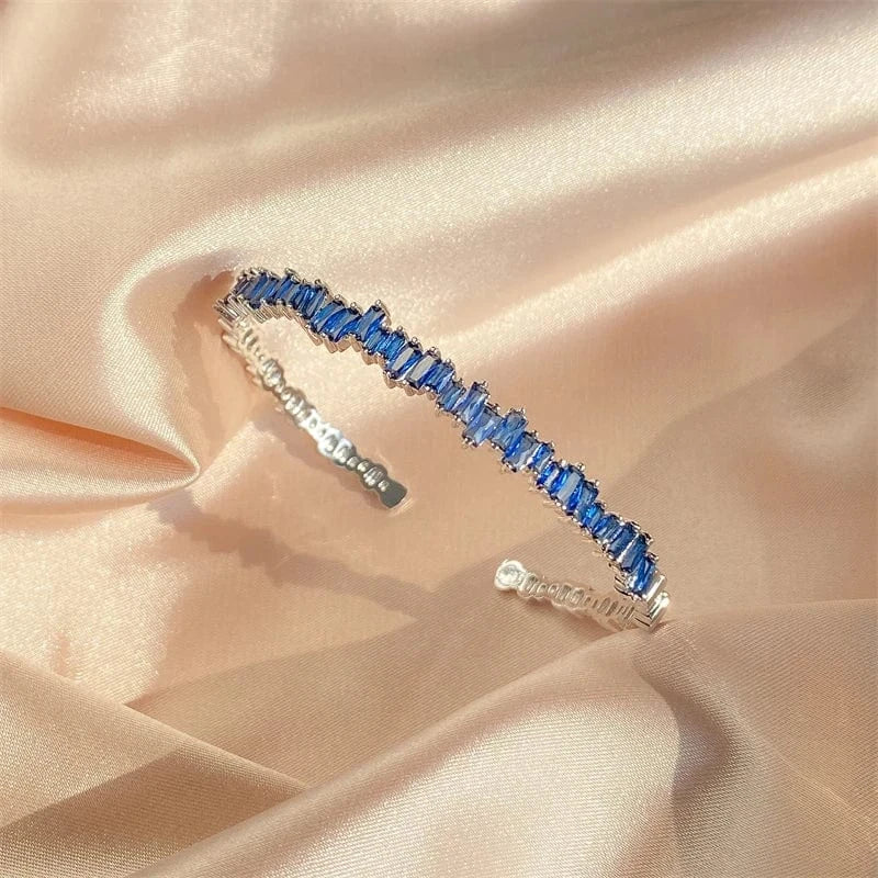 The Carat Cave Blue Baguette CZ Open Cuff Bangle – Platinum Plated