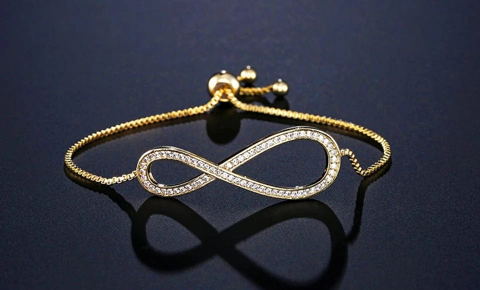 The Carat Cave Gold Infinite Symbol CZ Crystal Adjustable Bracelet