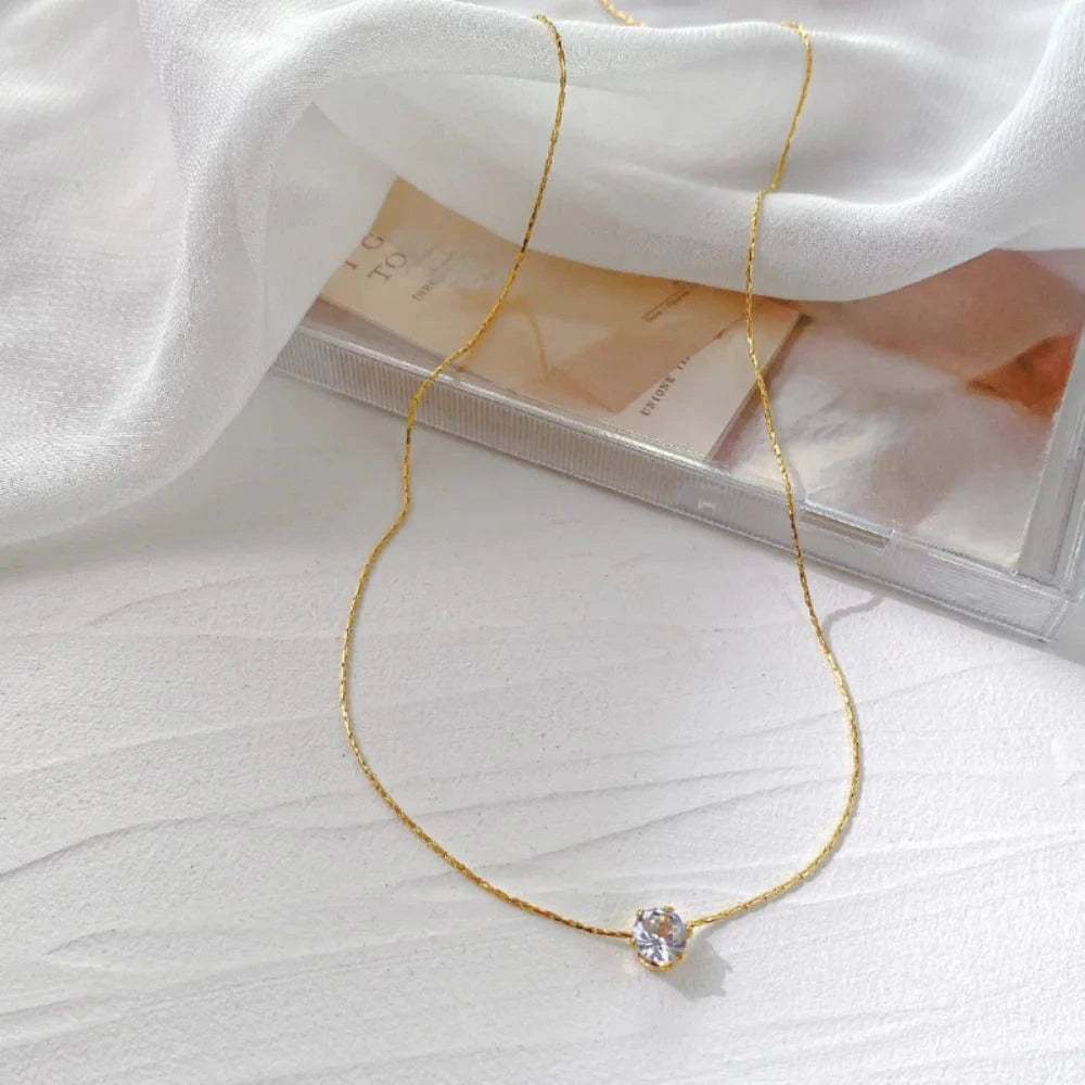 The Carat Cave Gold plated Charm zircon minimalistic necklace