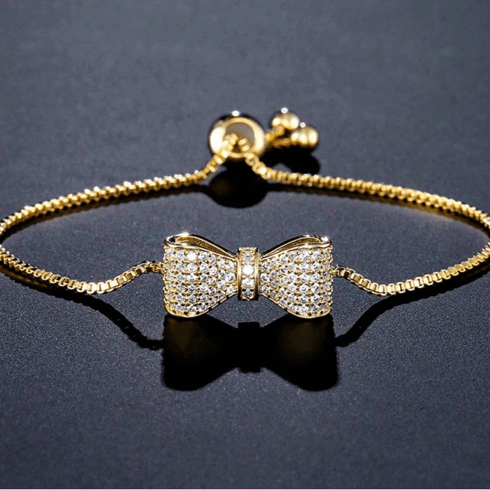 The Carat Cave Gold Bow CZ Crystal Adjustable Bracelet