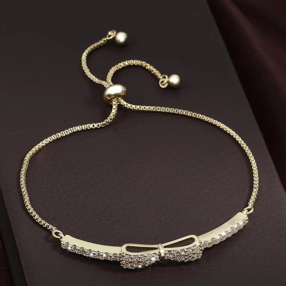 The Carat Cave Gold Minimalist Bow CZ Crystal Adjustable Bracelet